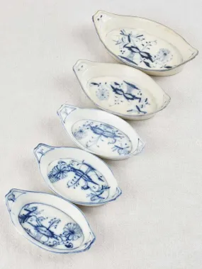 5 blue and white oval bowls