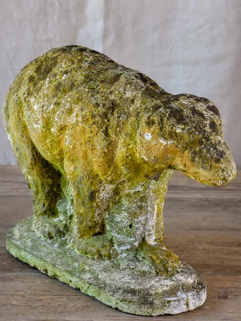 Antique garden sculpture of a bear