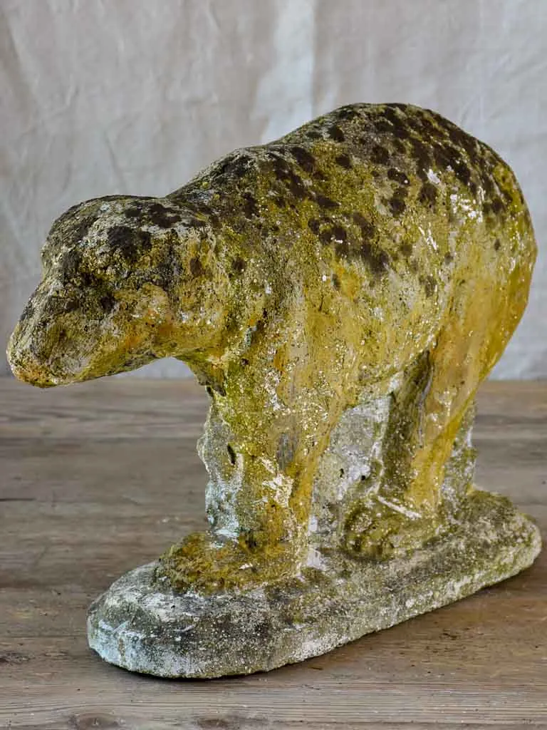 Antique garden sculpture of a bear