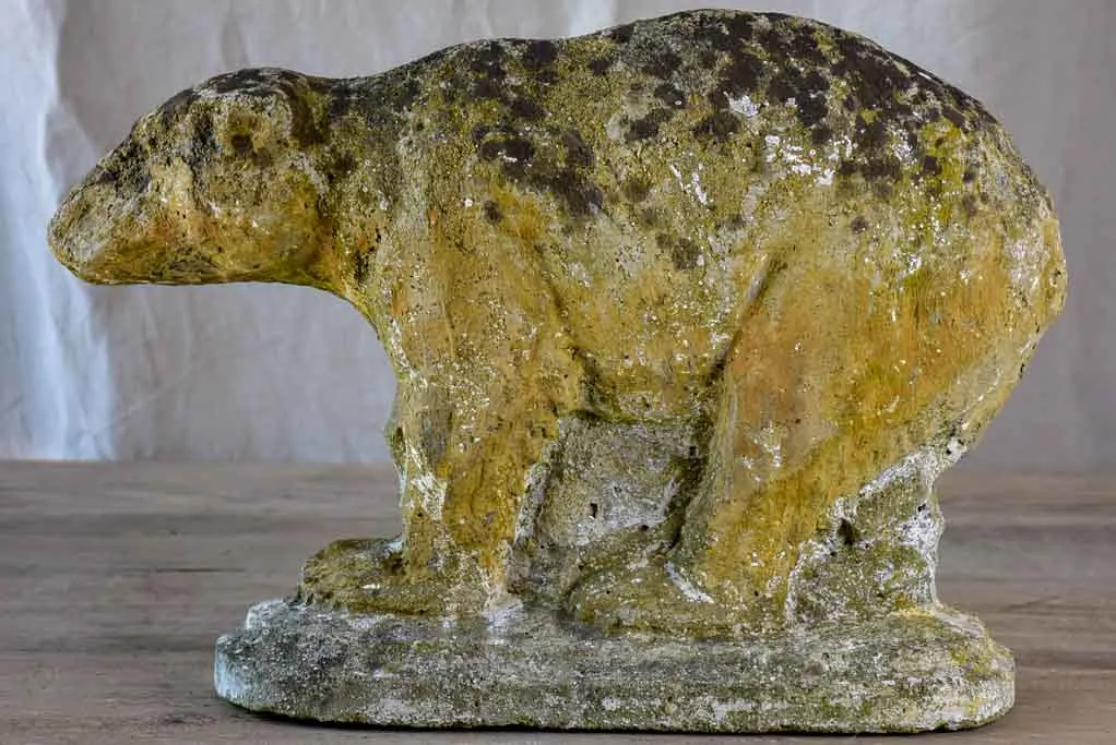 Antique garden sculpture of a bear