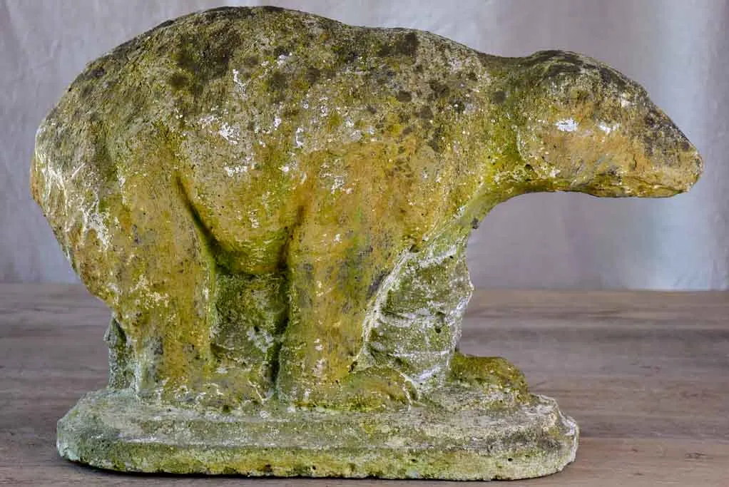 Antique garden sculpture of a bear