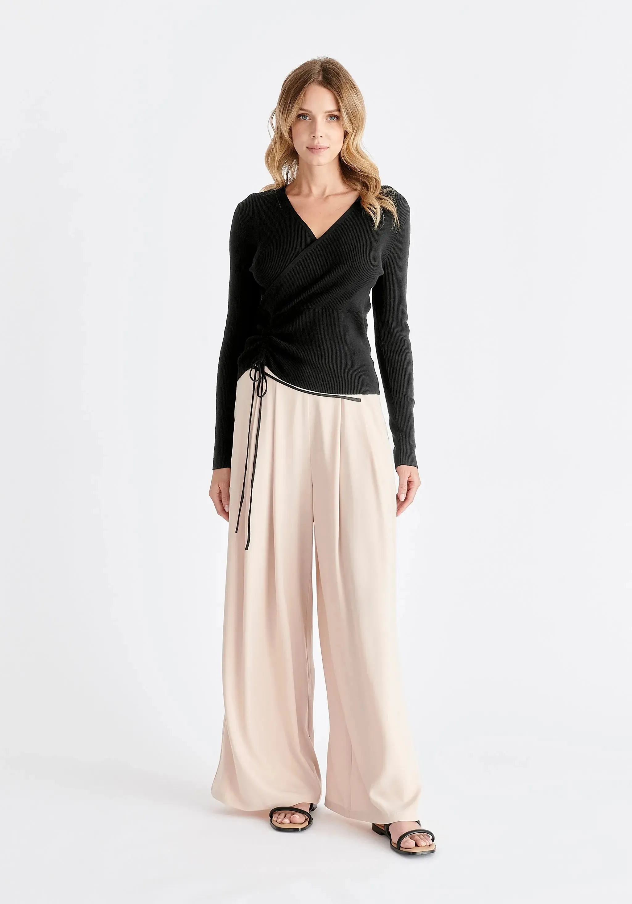 Beige and Black Asymmetric Waistband Trousers