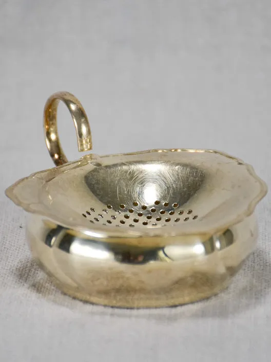 English two-piece tea strainer from the 1930's - silver plate