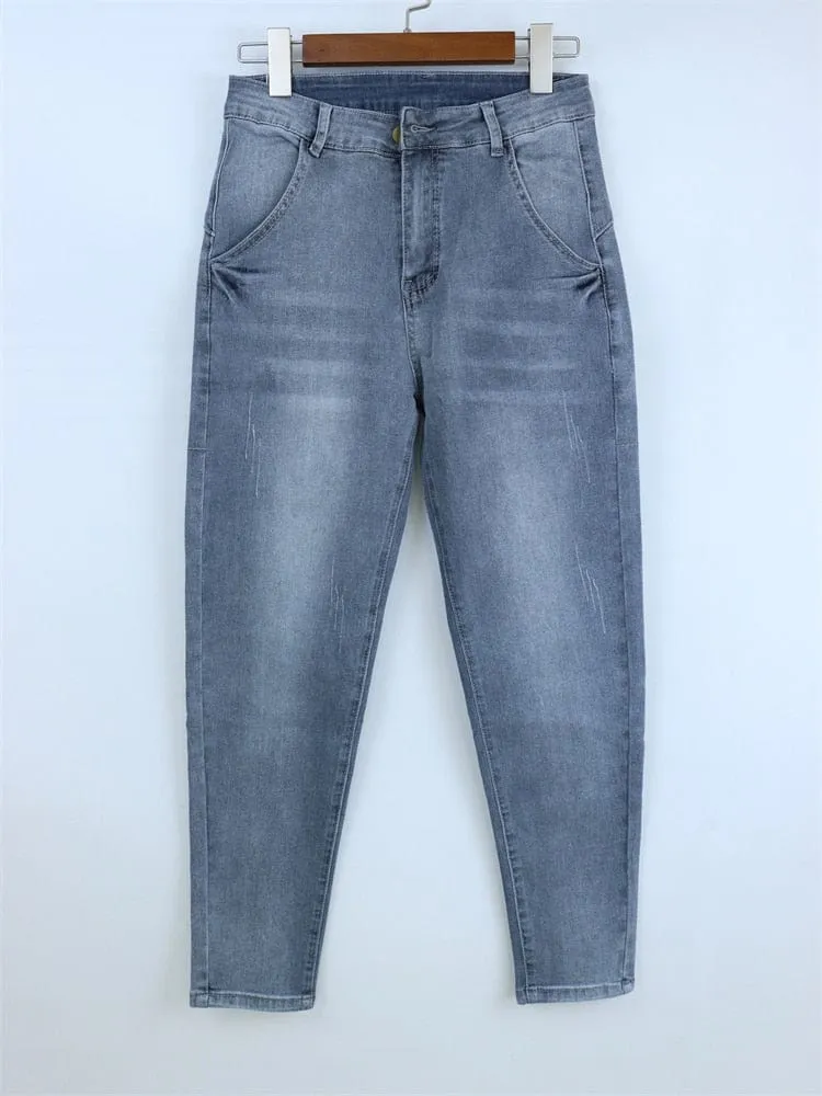 Loose Elastic Bleach Scratch Denim Pants