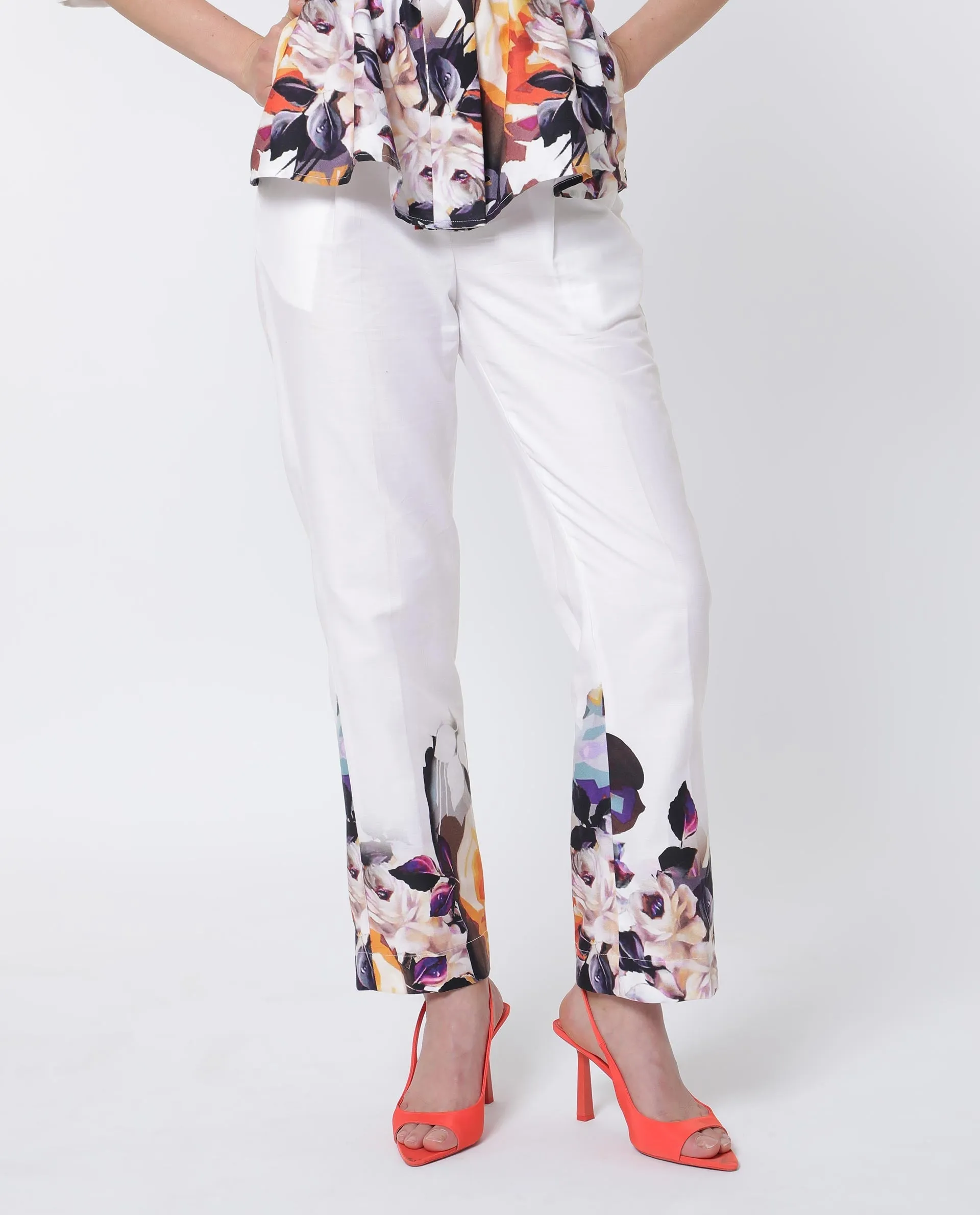 Rareism Women Weigen White Cotton Fabric Relaxed Fit Floral Print Ankle Length Trousers