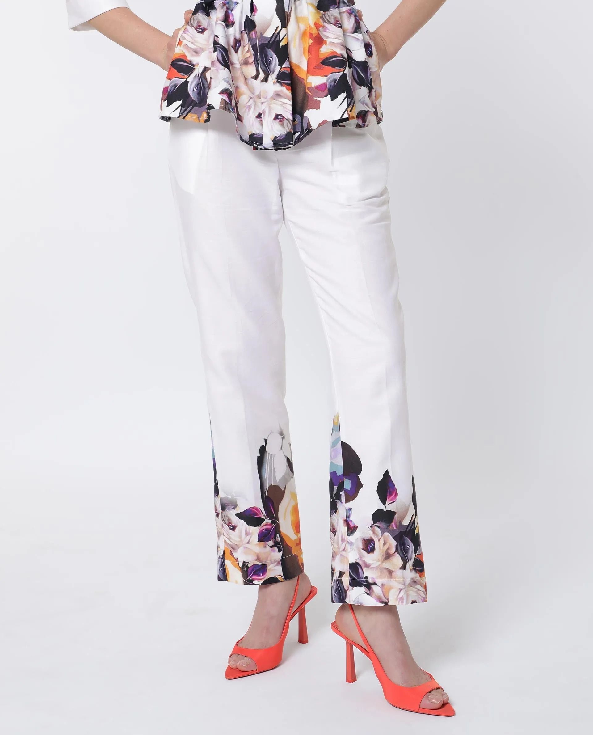 Rareism Women Weigen White Cotton Fabric Relaxed Fit Floral Print Ankle Length Trousers